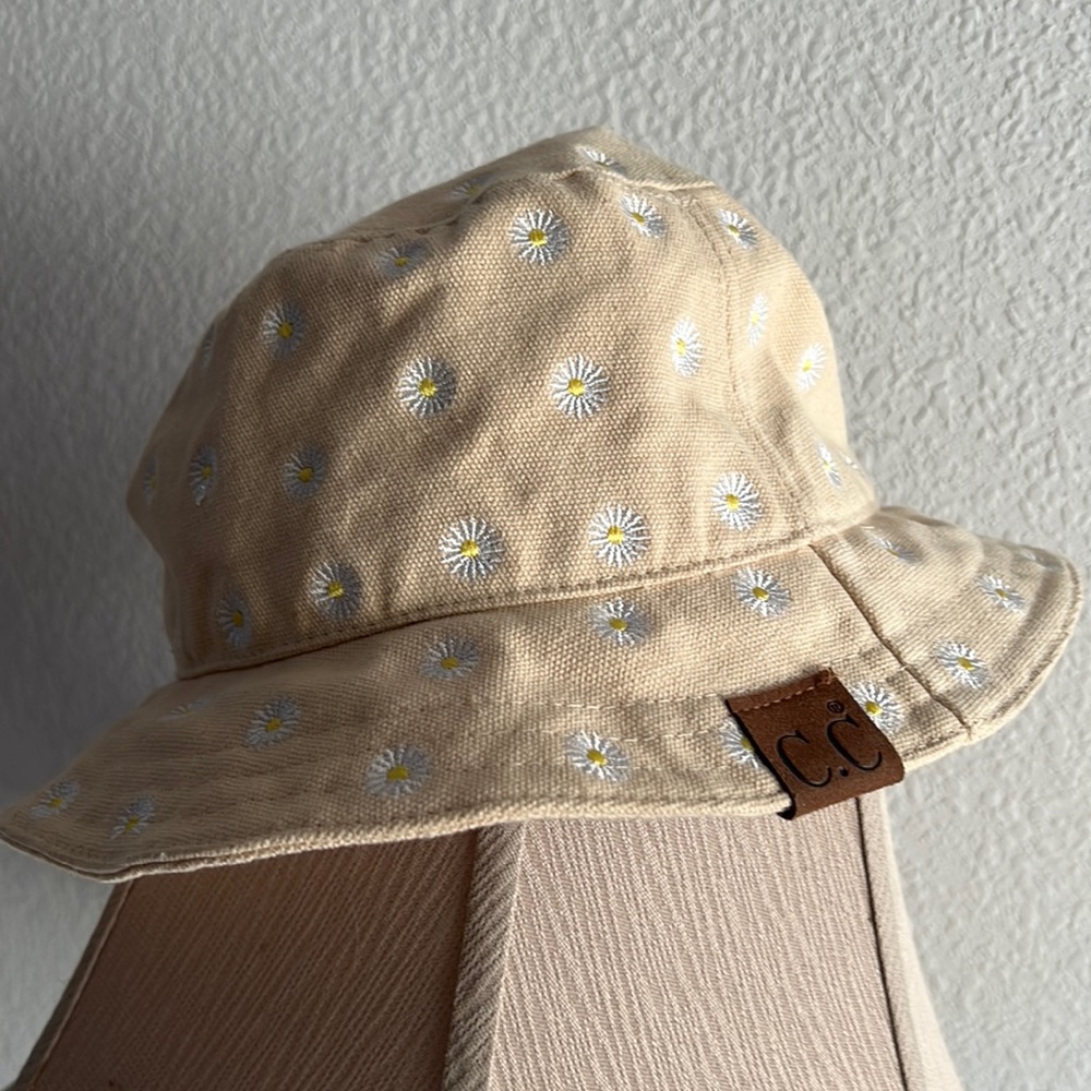 C.C light yellow bucket hat with stitched daisies